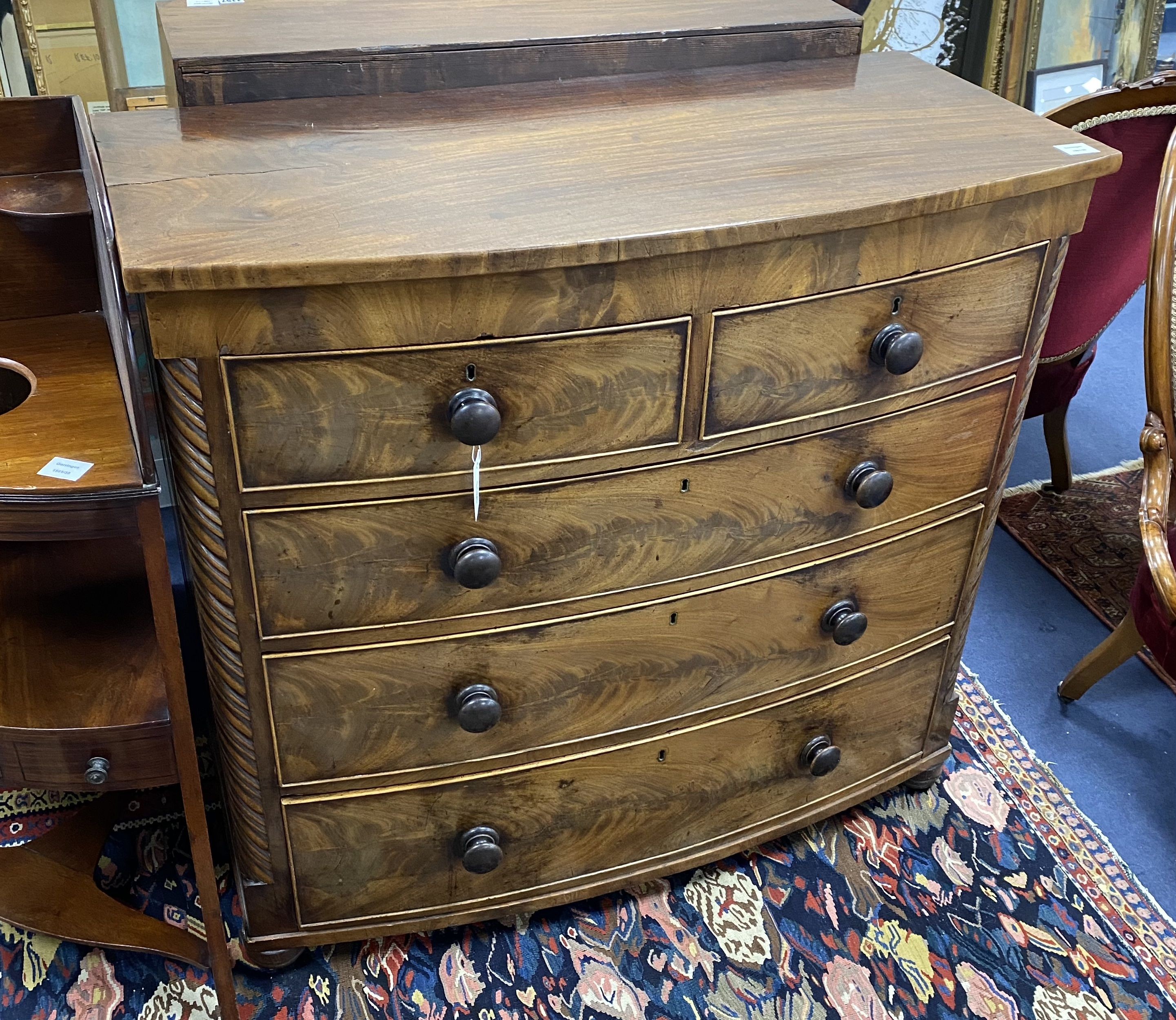 An early Victorian mahogany bow fronted chest of drawers, width 108cm, depth 51cm, height 102cm